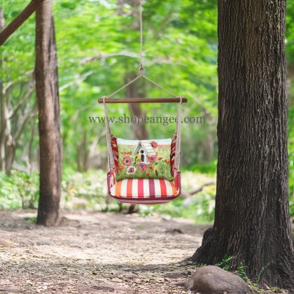 In a sunlit patio lounge a yellow outdoor swing crafted by the artisans of Magnolia Casual called the Swing Set 4 piece Cristina Stripe w/ Yellow Birds and Poppy Field is displayed featuring 100 percent weather resistant fabric, weather resistant polyester fabric, handcrafted adding comfort and style to the space featuring with a stripe motif and shades of yellow.