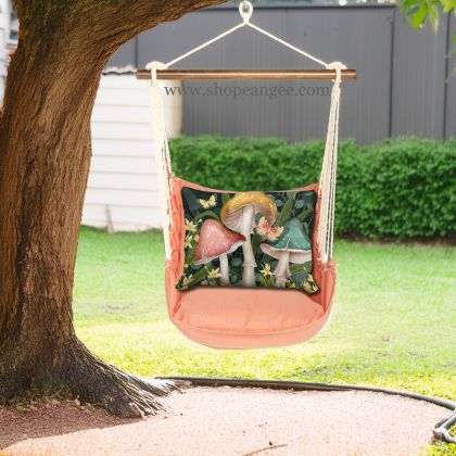 In an outdoor reading nook a multi colored outdoor swing crafted by the artisans of Magnolia Casual called the Swing Set 4 piece Living Coral w/ Mushroom Trio is displayed featuring 100 percent weather resistant fabric, weather resistant polyester fabric, handcrafted adding comfort and style to the space featuring with a coral motif and shades of coral.