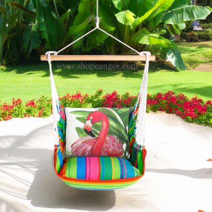 In a cozy garden seating area a pink outdoor swing crafted by the artisans of Magnolia Casual called the Swing Set 4 piece Le Jardin Nouveau w/ Flamingo Pink is displayed featuring 100 percent weather resistant fabric, weather resistant polyester fabric, handcrafted adding comfort and style to the space featuring shades of pink.