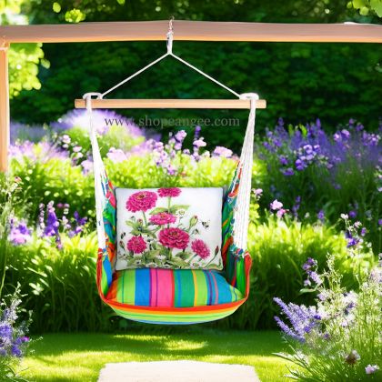 In a shaded porch swing a pink outdoor swing crafted by the artisans of Magnolia Casual called the Swing Set 4 piece Le Jardin Nouveau w/ Pink Zinnias is displayed featuring 100 percent weather resistant fabric, weather resistant polyester fabric, handcrafted adding comfort and style to the space featuring shades of pink.