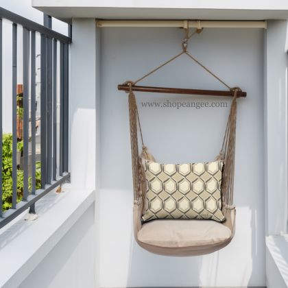 In a cozy garden seating area a multi colored outdoor swing crafted by the artisans of Magnolia Casual called the Swing Set 4 piece Latte Solid w/ Vintage Mirrors is displayed featuring 100 percent weather resistant fabric, weather resistant polyester fabric, handcrafted adding comfort and style to the space.