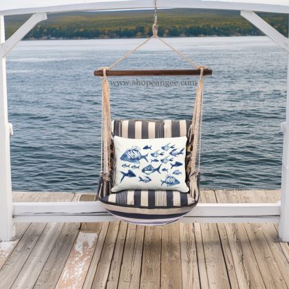 In a cozy garden seating area a multi colored outdoor swing crafted by the artisans of Magnolia Casual called the Swing Set 4 piece Marina Stripe w/ Underwater Ballet is displayed featuring 100 percent weather resistant fabric, weather resistant polyester fabric, handcrafted adding comfort and style to the space featuring with a stripe motif.