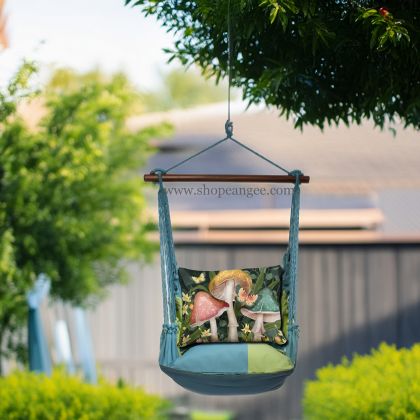 In a shaded porch swing a multi colored outdoor swing crafted by the artisans of Magnolia Casual called the Swing Set 4 piece Meadow Mist Stripe w/ Mushroom Trio is displayed featuring 100 percent weather resistant fabric, weather resistant polyester fabric, handcrafted, natural materials adding comfort and style to the space featuring with a stripe motif.