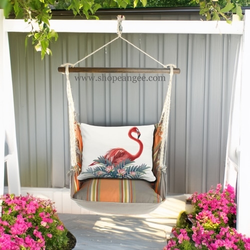 In a coastal inspired deck chair a pink outdoor swing crafted by the artisans of Magnolia Casual called the Swing Set 4 piece Serene Sunset w/ Vivid Flamingo Pink is displayed featuring 100 percent weather resistant fabric, weather resistant polyester fabric, handcrafted adding comfort and style to the space featuring shades of pink.