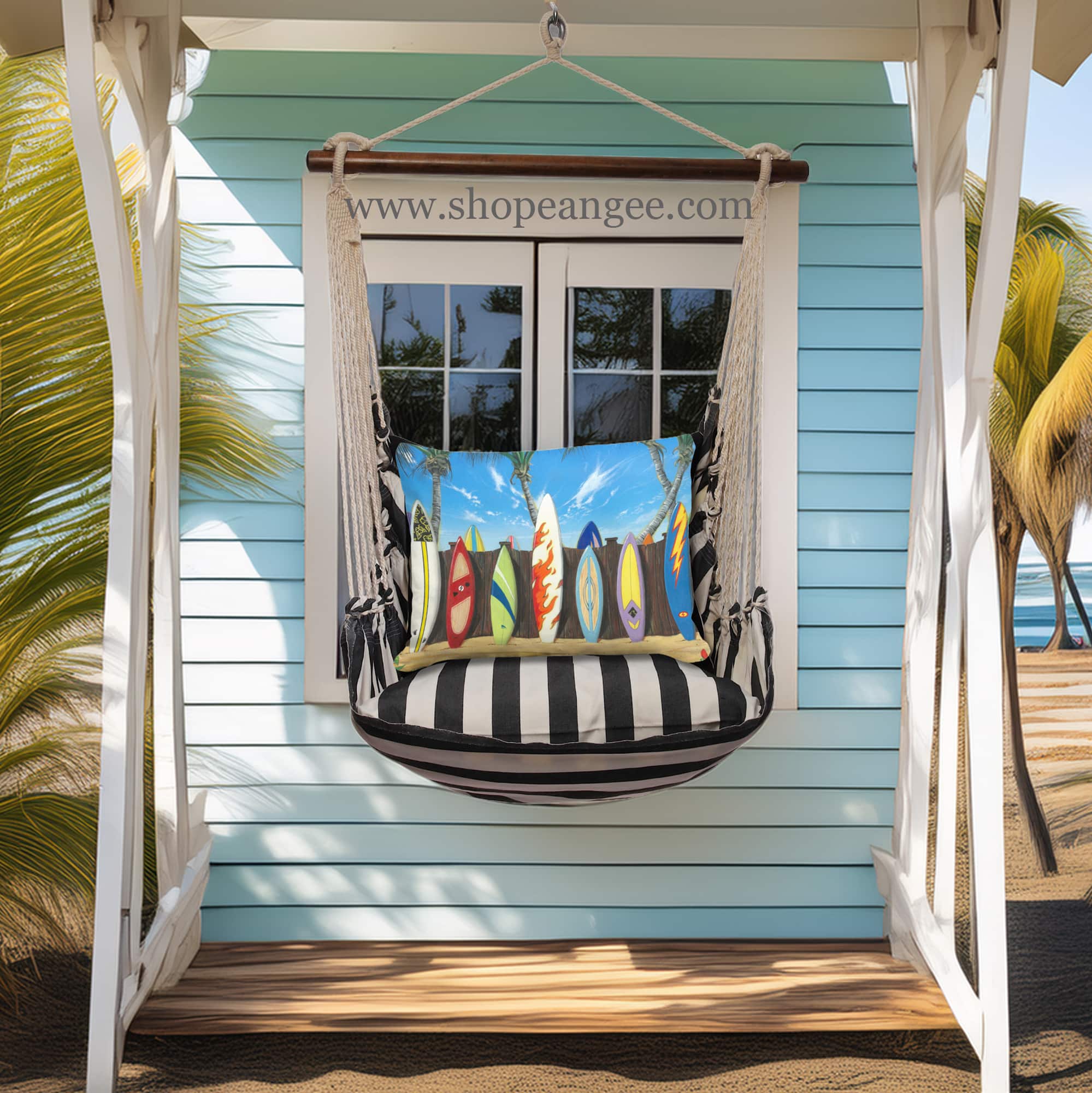 In a coastal inspired deck chair a black outdoor swing crafted by the artisans of Magnolia Casual called the Swing Set 4 piece True Black Stripe w/ Surf Boards on Fence is displayed featuring 100 percent weather resistant fabric, weather resistant polyester fabric, handcrafted adding comfort and style to the space featuring with a stripe motif and shades of black.