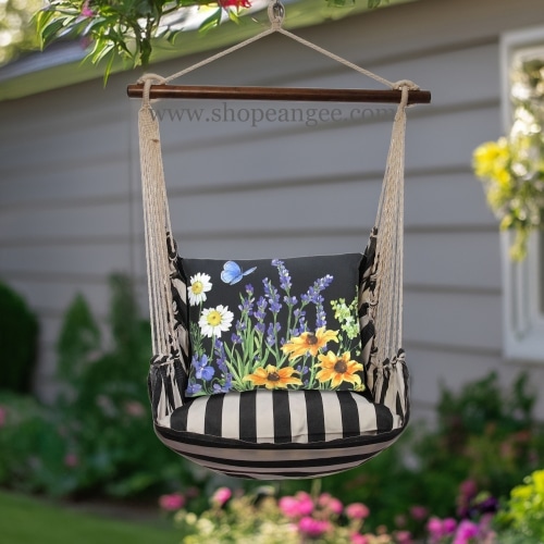 In a poolside chaise a black outdoor swing crafted by the artisans of Magnolia Casual called the Swing Set 4 piece True Black Stripe w/ Garden Meadow 1 is displayed featuring 100 percent weather resistant fabric, weather resistant polyester fabric, handcrafted adding comfort and style to the space featuring with a stripe motif and shades of black.
