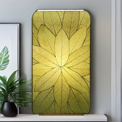 Sunburst?pattern table lamp crafted by Eangee Home Design featuring radial green fossilized leaf panels over wrought iron; sculptural burst design comes to life as ambient light pours through every vein; sustainably handcrafted by skilled artisans