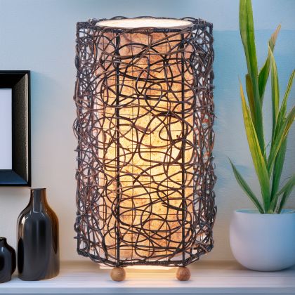 Crafted by the artisans of Eangee Home Design, the Nito Table Lamp in natural against a clean backdrop, featuring recycled paper shade, sustainably sourced.