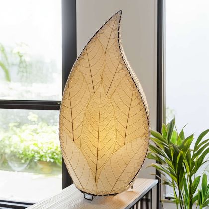 Leaf?shaped Leaflet table lamp crafted by Eangee Home Design with natural fossilized cocoa leaves stitched by hand to wrought iron; budding?leaf form breathes life as ambient light glows through translucent cocoa leaves; artisan?made from sustainable materials
