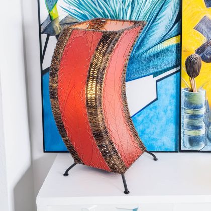 Sculptural table lamp crafted by Eangee Home Design fashioned from red natural leaves; organic texture revealed as ambient light filters through the natural leaf veins; sustainably handcrafted by skilled artisans