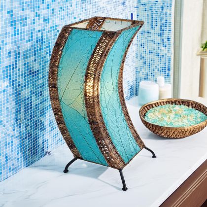 Sculptural table lamp crafted by Eangee Home Design fashioned from sea blue natural leaves; organic texture revealed as ambient light pours through the natural leaf veins; artisan?made with renewable materials