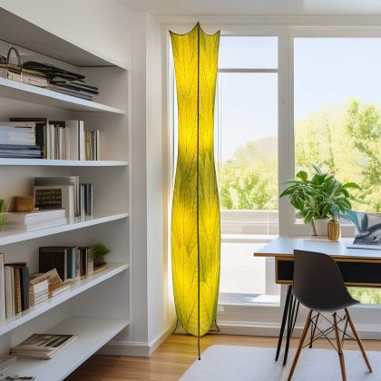 In a modern living room, the Flowerbud Giant Floor crafted by the artisans of Eangee Home Design Lamp in green finish by Eangee Home Design stands tall, its fossilized cocoa leaf panels and hand placed natural leaves casting a warm glow that the flower bud giant floor lamp draws you in before it even lights up.