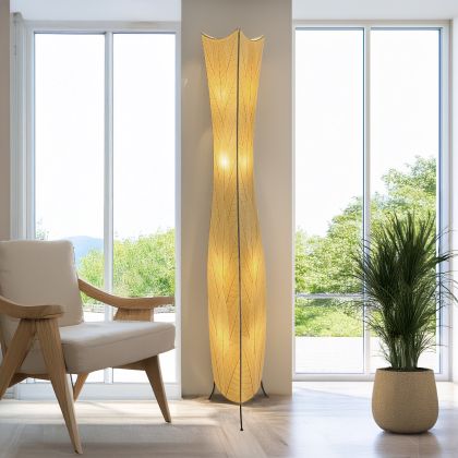 In a modern interior with earth tones, crafted by the artisans of Eangee Home Design, the Flowerbud Giant Floor Lamp in natural stands gracefully, featuring fossilized cocoa leaf shade, adding warmth and character to the space.
