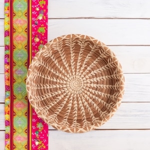 Cecilia handmade woven basket in natural fiber with decorative lid
