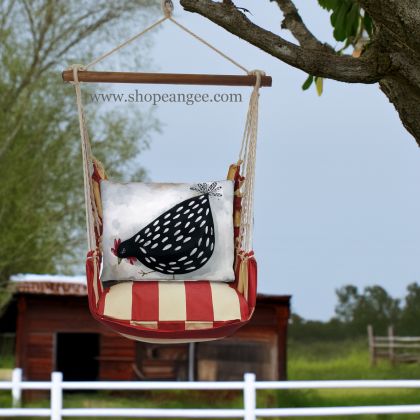 In a shaded porch swing a multi colored outdoor swing crafted by the artisans of Magnolia Casual called the Swing Set 4 piece Americana Stripe w/ Good Chick is displayed featuring 100 percent weather resistant fabric, weather resistant polyester fabric, handcrafted adding comfort and style to the space featuring with a stripe motif.