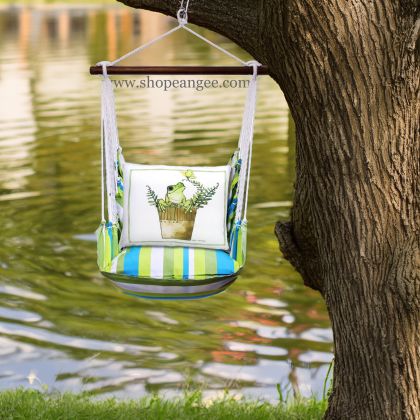 In a cozy garden seating area a multi colored outdoor swing crafted by the artisans of Magnolia Casual called the Swing Set 4 piece Beach Boulevard Stripe w/ Frog in Pot is displayed featuring 100 percent weather resistant fabric, weather resistant polyester fabric adding comfort and style to the space featuring with a stripe motif.