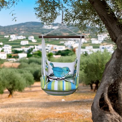 In a cozy garden seating area a blue outdoor swing crafted by the artisans of Magnolia Casual called the Swing Set 4 piece Beach Boulevard Stripe w/ Blue Bird on Branch is displayed featuring 100 percent weather resistant fabric, weather resistant polyester fabric adding comfort and style to the space featuring with a stripe motif and shades of blue.