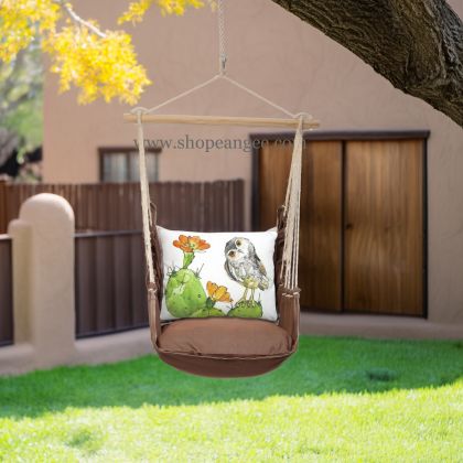 In a shaded porch swing a multi colored outdoor swing crafted by the artisans of Magnolia Casual called the Swing Set 4 piece Chocolate Solid w/ Owl on Prickly Cactus is displayed featuring 100 percent weather resistant fabric, weather resistant polyester fabric, artisan, natural materials adding comfort and style to the space featuring with a owl motif.