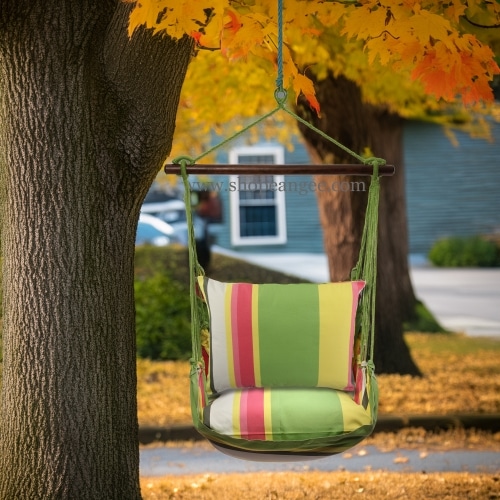 In a poolside chaise a multi colored outdoor swing crafted by the artisans of Magnolia Casual called the Swing Set 4 piece Fresh Lime Stripe w/ Fresh Lime Stripe Pillow is displayed featuring 100 percent weather resistant fabric, weather resistant polyester fabric, handcrafted adding comfort and style to the space featuring with a stripe motif and shades of lime.