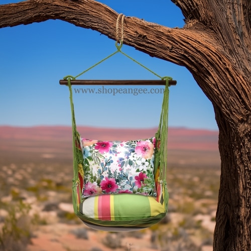 In a poolside chaise a multi colored outdoor swing crafted by the artisans of Magnolia Casual called the Swing Set 4 piece Fresh Lime Stripe w/ Meadow Dance 1 is displayed featuring 100 percent weather resistant fabric, weather resistant polyester fabric, handcrafted adding comfort and style to the space featuring with a stripe motif and shades of lime.