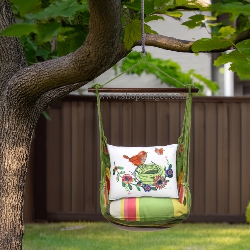 In a sunlit patio lounge a multi colored outdoor swing crafted by the artisans of Magnolia Casual called the Swing Set 4 piece Fresh Lime Stripe w/ Birds in Nest is displayed featuring 100 percent weather resistant fabric, weather resistant polyester fabric, handcrafted adding comfort and style to the space featuring with a stripe motif and shades of lime.