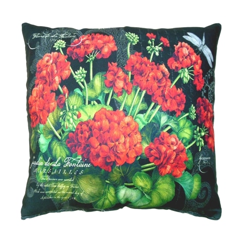 Red outdoor pillow crafted by the artisans of Magnolia Casual called the Outdoor Pillow Red Geranium featuring handwoven textile shown against a clean backdrop featuring shades of red.