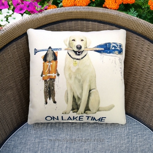In a poolside chaise a multi colored outdoor pillow crafted by the artisans of Magnolia Casual called the Outdoor Pillow Lake Time 18x18 is displayed featuring quality outdoor fabric adding comfort and style to the space.