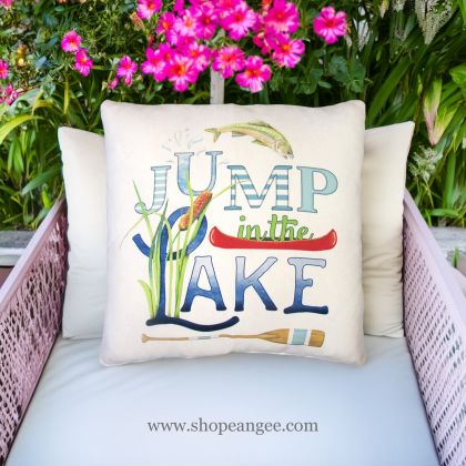 In a shaded porch swing a multi colored outdoor pillow crafted by the artisans of Magnolia Casual called the Outdoor Pillow Jump in Lake 18x18 is displayed featuring quality outdoor fabric adding comfort and style to the space.