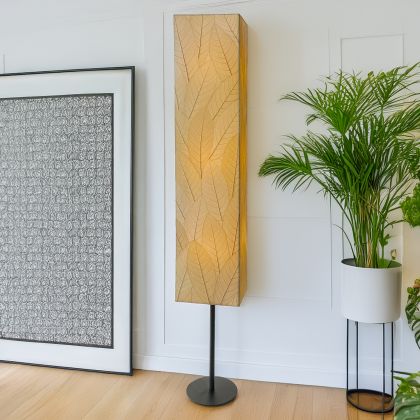 Sequoia Giant Floor Lamp in natural by Eangee Home Design - tall rectangular column wrapped in fossilized cocoa leaf panels hand-stitched to a powder-coated frame; diffuses gentle amber light for understated organic warmth.