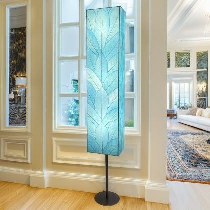 Sequoia Giant Floor Lamp in sea blue by Eangee Home Design - tall rectangular column wrapped in fossilized cocoa leaf panels hand-stitched to a powder-coated frame; casts a tranquil blue glow that adds coastal calm to the room.