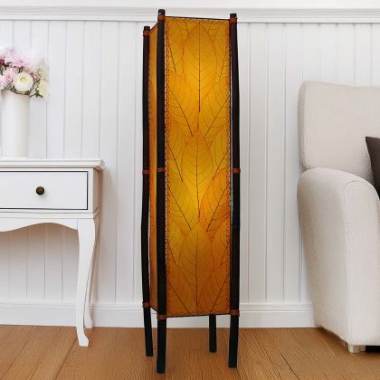 Orange Fortune square floor lamp, fossilized cocoa leaf panels on bamboo legs and abaca stitch, glowing with cozy golden light by Eangee Home Design