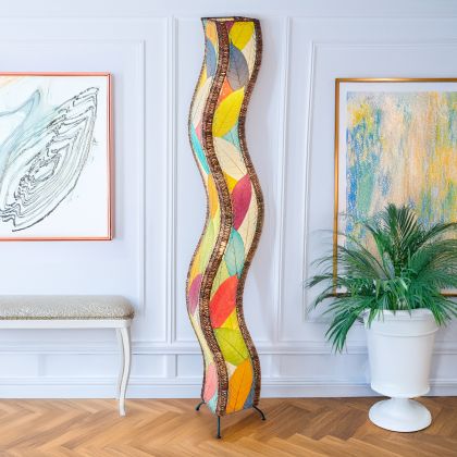 Multicolor Wave Giant Floor Lamp by Eangee Home Design - flowing wave silhouette wrapped in vibrant fossilized cocoa leaves; artisan piece radiates playful color currents that energize modern decor.