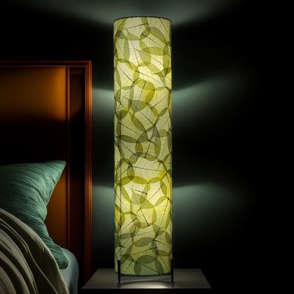 Green Banyan large floor lamp, leaf-patterned banyan panels on iron frame, radiates serene botanical light against dark wall by Eangee Home Design