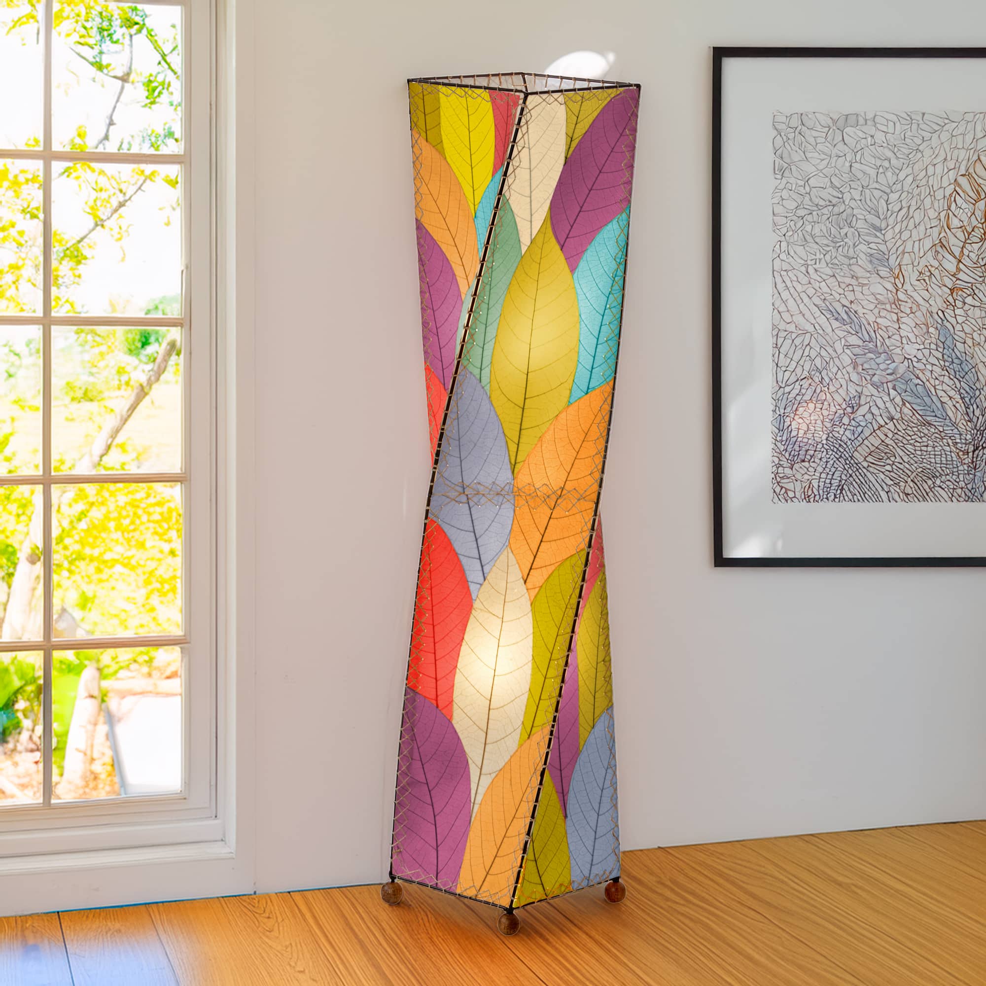 Multicolor Twist Large Floor Lamp by Eangee Home Design - vibrant twisting tower patch worked with colorful cocoa leaves; artisan lamp brightens a wall with playful ambient hues.