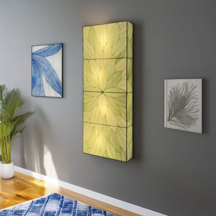 Sunburst Panel Wall Lamp in green by Eangee, slim vertical triptych of real cocoa leaves on a gray accent wall
