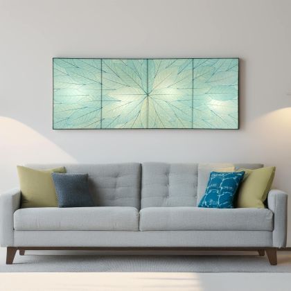 Sunburst Panel Wall Lamp in sea blue by Eangee, four cocoa leaf panels illuminating a contemporary grey sofa space
