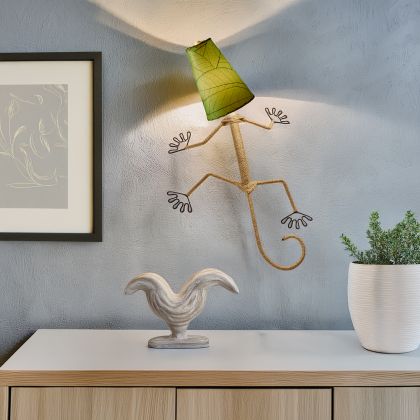 Eangee Home Design Gecko Wall Sconce in green with a shade made of real cocoa leaves, nature?inspired gecko light enhancing a modern entryway