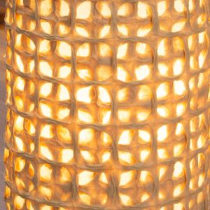 handmade texture close-up of handmade paper shade with layered fibers and grid pattern